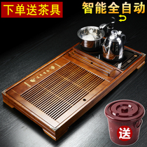 Automatic household tea table Solid wood tea tray with electric and magnetic stove Tea sea set Kung Fu tea set Four-in-one tea tray