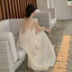 ພັກຜ່ອນແຄມທະເລຊາຍຫາດ dress ຂອງແມ່ຍິງວ່າງ niche ການອອກແບບຂະຫນາດໃຫຍ່ backless dress Xishuangbanna suspender ຍາວ skirt summer