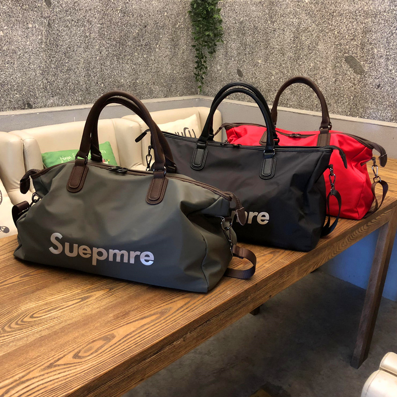 Net red travel bag men hand carrying short business trip travel duffel bag women large capacity wet and dry separation sports fitness bag