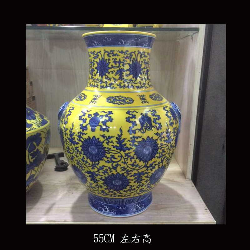 Jingdezhen porcelain vase hand - made of hand - made imitation qianlong imperial porcelain porcelain pomegranate pomegranate bottles on yellow background