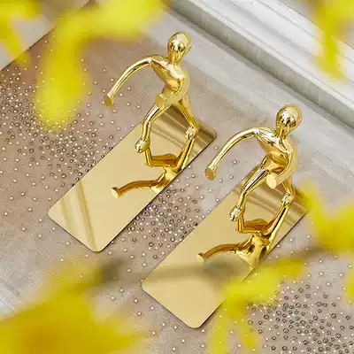 Simple light luxury little gold man book by bookcase study ornaments European style American model room bookend decoration artwork