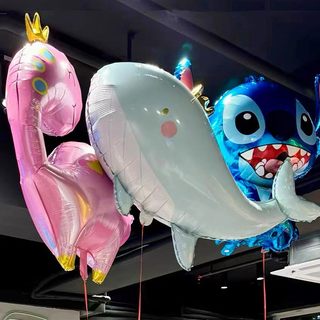 Various styles of helium-filled air balloons