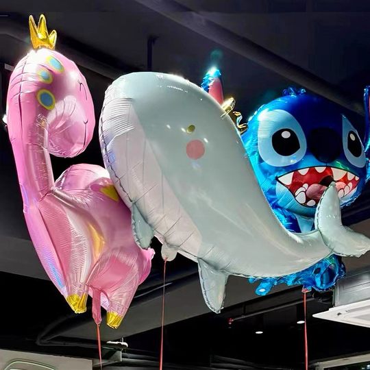 Various styles of helium-filled air balloons