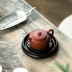 Nồi kiểu Nhật với bàn ngâm khô bakelite nhỏ miếng lót cách nhiệt bakelite ngăn đựng cốc coaster màu tím cát ấm trà bộ khay trà - Trà sứ