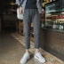Phong cách Hồng Kông hè mới quần âu nam phiên bản Hàn Quốc theo xu hướng của sinh viên hoang dã thẳng quần chín quần quần đen thoáng khí Crop Jeans