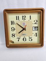 Early Wuxi produced red plum battery wall clock with calendar nostalgic old-fashioned quartz clock related to Sanwu Polaris