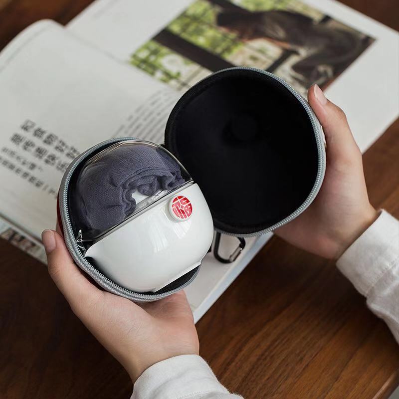 Dehua white porcelain cup to crack a pot of portable travel two cups of tea set outdoors travel package teapot kung fu tea cups