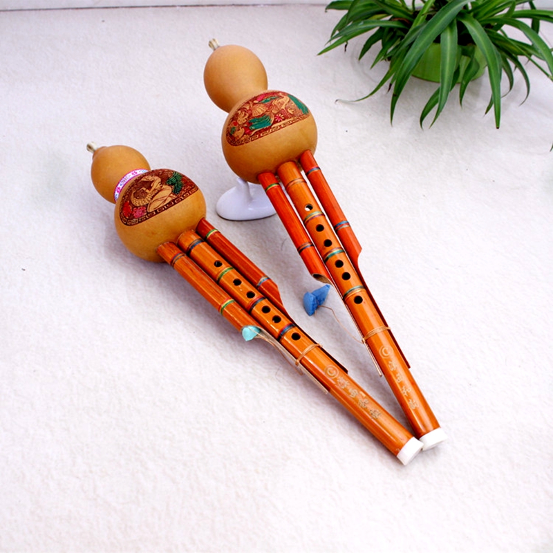 Yunnan Huluth musical instrument natural Fengtailed bamboo double tone tied seven colored thread cucubiturus C cut to B tunic practice use