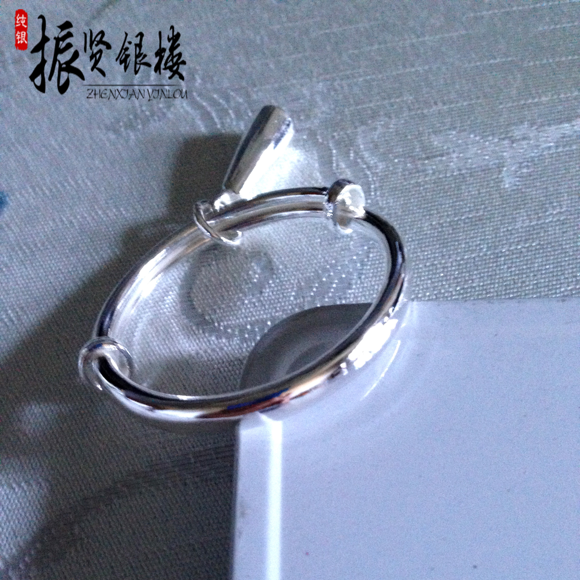 Zhenxian silver building 9999 pure silver grinding tooth stick pendant children's foot silver bracelet round bar loach back winding silk pushing circle round button