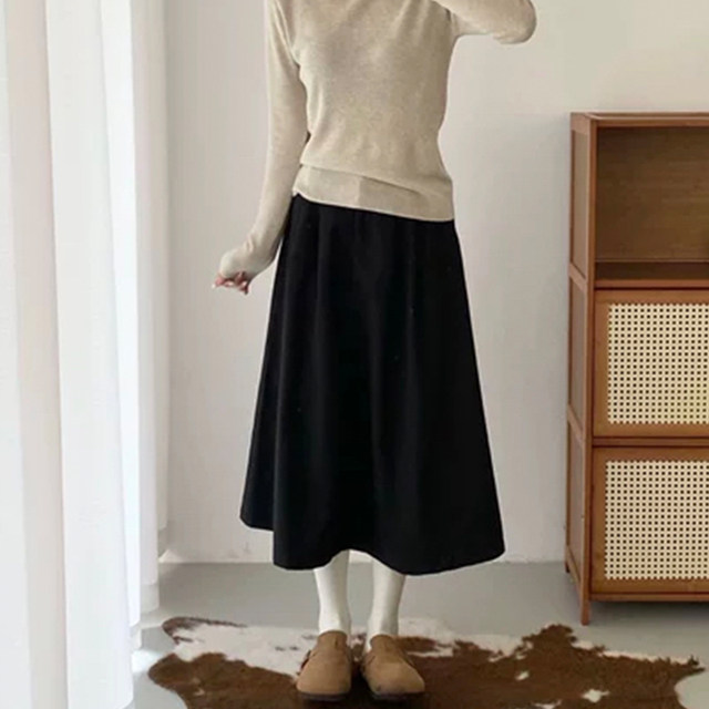 Crotch-covering A-line skirt for petites with pressed pleats and drapey umbrella skirt