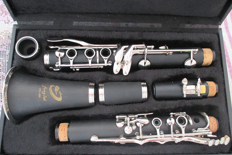 B - clarinet lowering B - black tube black tube musical instrument beginner - grade clarinet production plant