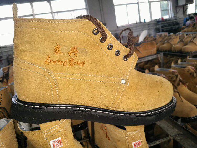 High tube low top Liangxing labor insurance shoes steel head steel sole shoes tire sole shoes wear-resistant shoes suede shoes work shoes