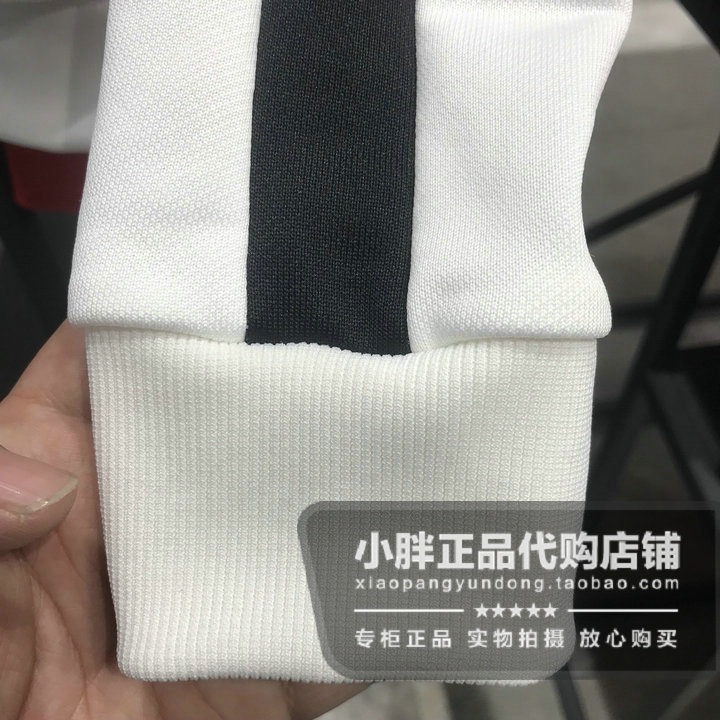 Áo khoác PUMA PUMA nữ 2019 xuân mới quần áo thể thao giản dị cổ áo dệt kim cổ áo chạy 579060 - Áo khoác thể thao / áo khoác áo khoác anta