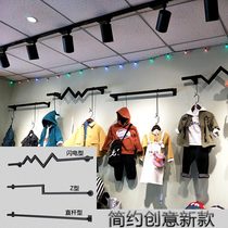 Clothing display on the wall hangers adhesive hook is hanging clothes hangers iron clothing rack simple modern