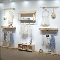 Clothing store solid wood display rack childrens clothing store decoration combination rack log upper wall front side hanging display shelf hanger