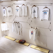 Clothing store decoration wall-mounted display rack on the wall selling clothes on the iron wall is hanging wall-mounted multi-function
