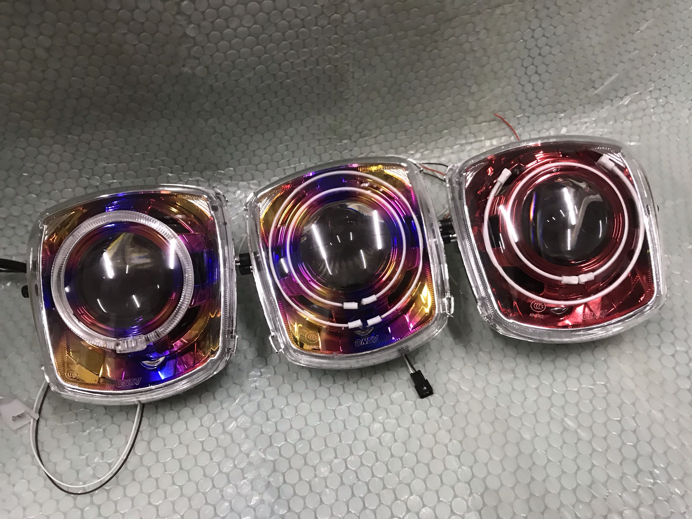 Cool fire titanium hood lens assembly