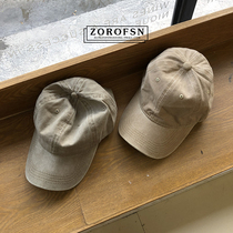Spring and summer washed cotton cotton pure color Japanese cap ins men and women Black Korean soft top baseball hat tide