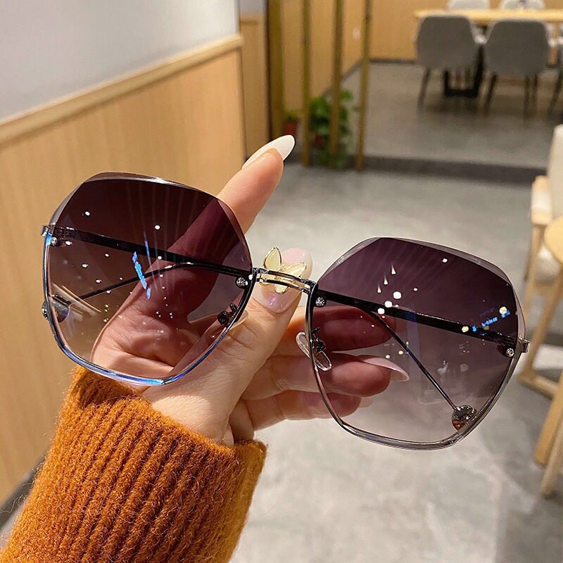 2022 New frame-free cutting edge round sun glasses Tide Pistachio Sunglasses Female large face Slim Glasses Anti UV