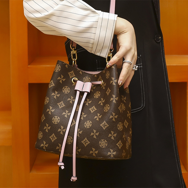 French DUDK luxury brand leather drawstring bucket bag old flower women's bag large-capacity one-shoulder retro messenger bag