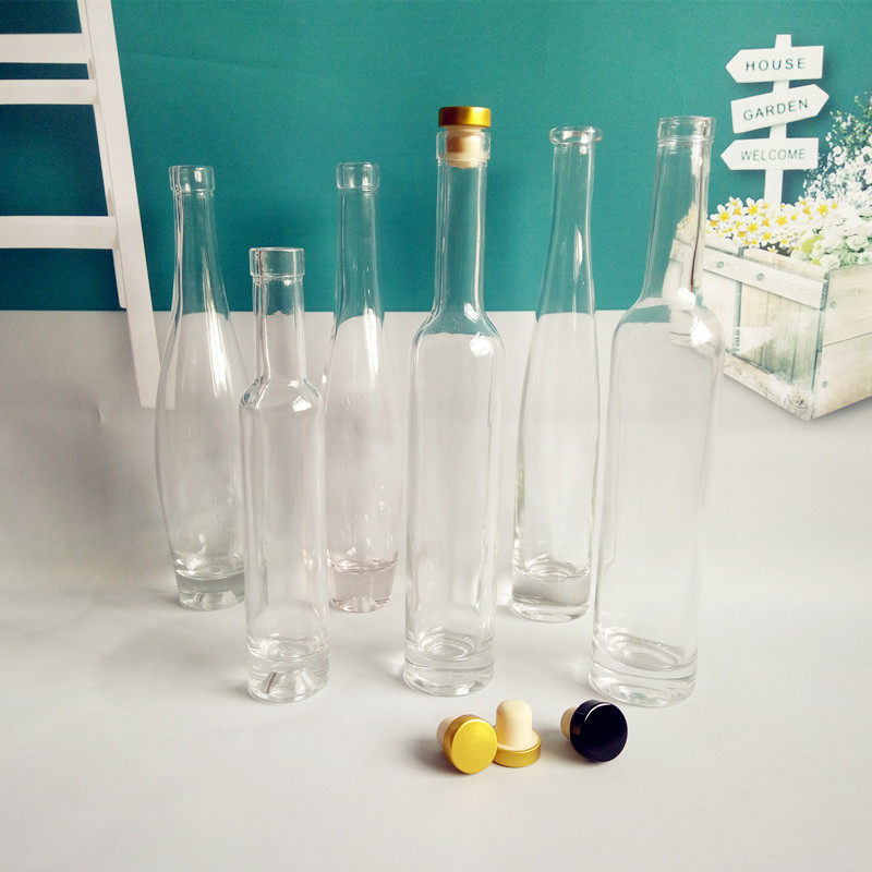 Fine white material glass wine bottle 500ml transparent grape fruit wine high-end wine bottle delivered with high molecular plug rubber cap