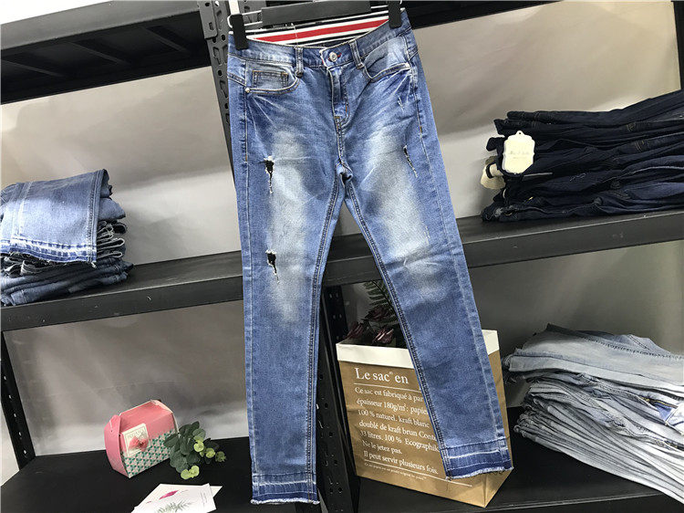 Clearance original single women's spring and autumn new ripped hole old elastic Korean version was thin and legged mid-waist jeans 9382