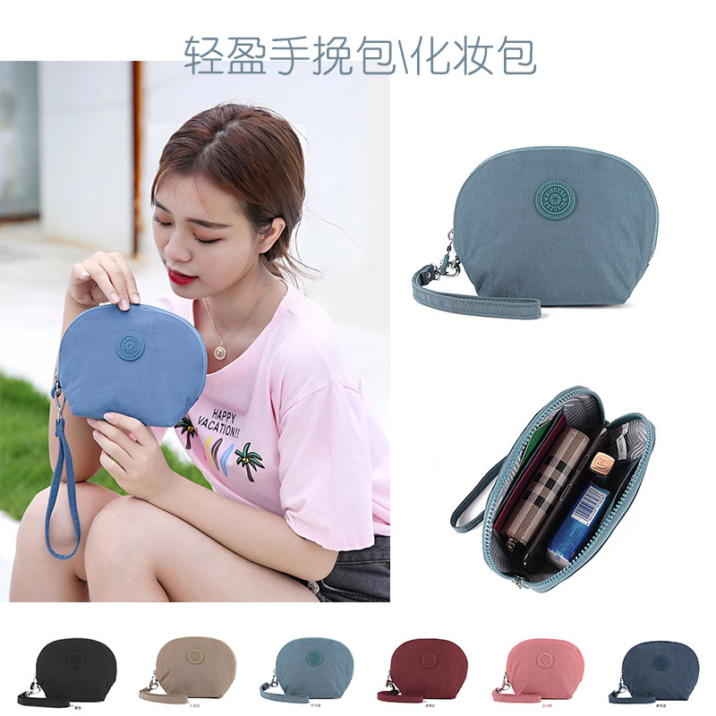 Fashion hand-held cosmetic bag women's lightweight capacity large water-repellent nylon cloth mobile phone passport change card storage bag
