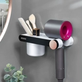 На полке фен, стойка для волос в ванной комнате, Дайсон Лейфен положил стойку для удара