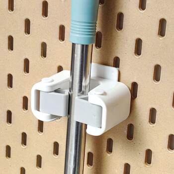 Mop broom storage hole plate