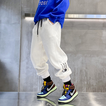 2021 new childrens spring clothing sports pants boys letters Han version of foreign air casual wear for childrens knitted pants tide