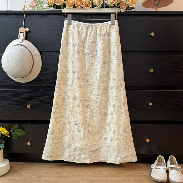 High-end heavy-duty glittering sequins embroidered jacquard skirt for women autumn 2025 high-waist slimming A-line hip skirt