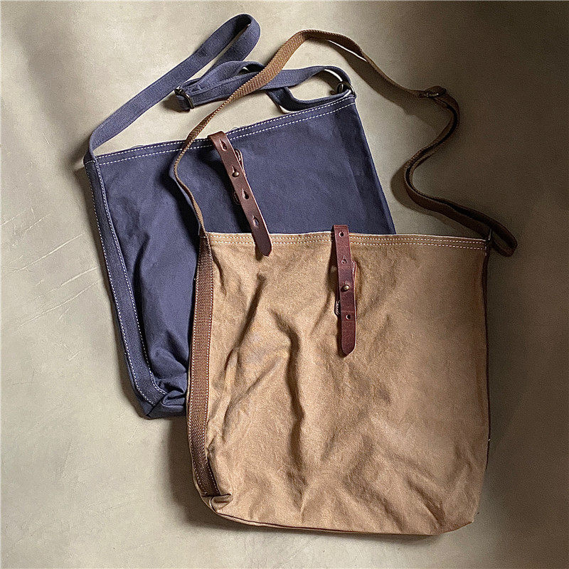 Pick up the classic neutral minimalist canvas Bull Leather Large Capacity Diagonal Satchel for men and women Young retro single shoulder bag