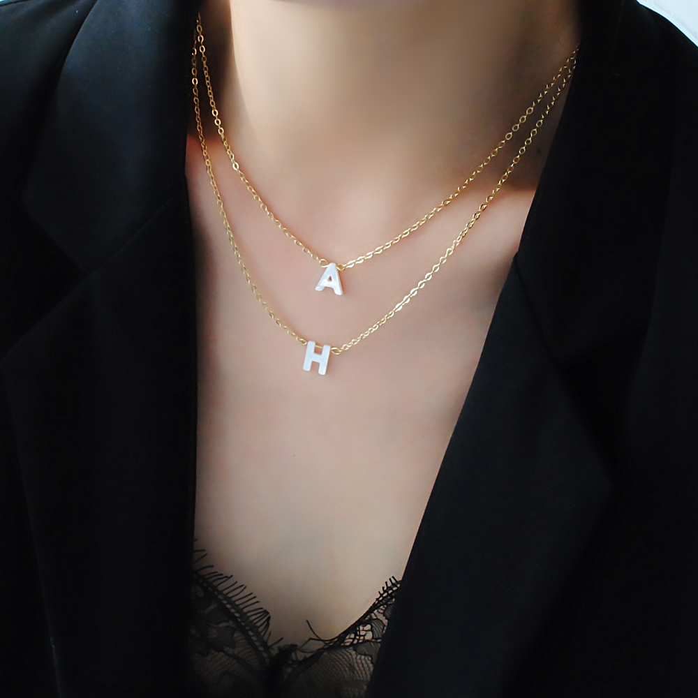 French natural white butterfly shell letter necklace female 14K gold short high-quality neck necklace niche ins collarbone chain