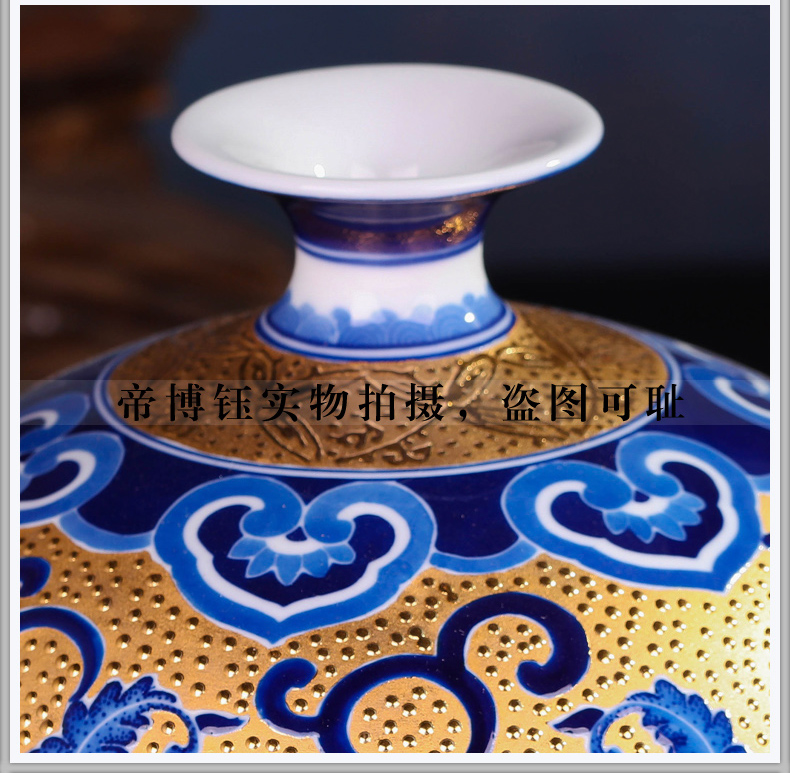 Jingdezhen ceramic hand - made gold wrapped branch lotus celestial vases, Chinese arts and crafts porcelain sitting room adornment is placed