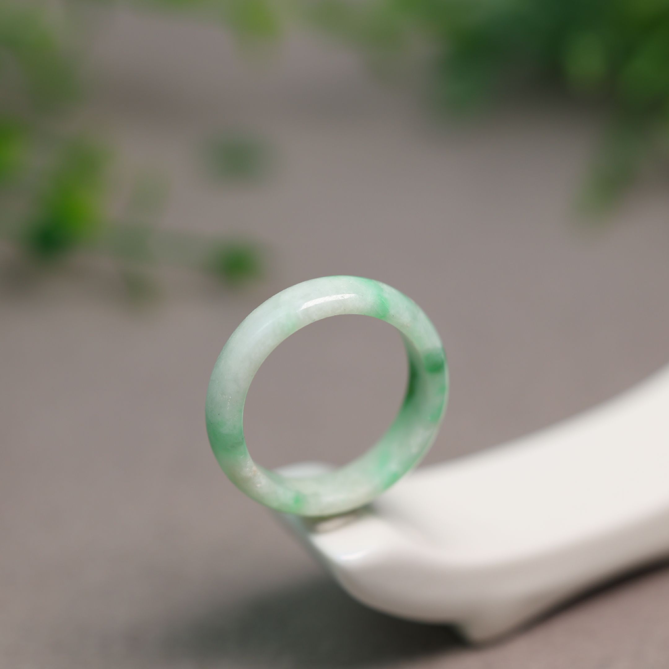 Floating Yang Green Natural Grade A Jadeite Ring on White Background
