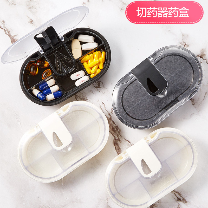 Japan's portable small medicine box multi-packed travel comes with a medicine cutter medicine storage box mini sealed flip