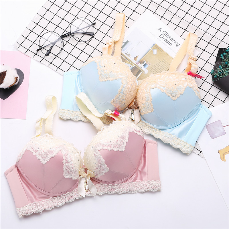 Cô gái áo ngực dày tập hợp bên để điều chỉnh đồ lót sâu V ren lụa bộ sưu tập chèn sữa túi sữa che bán buôn áo ngực học sinh