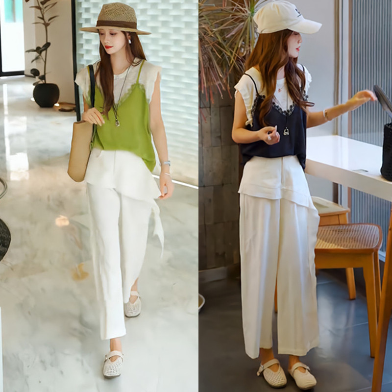 A Unique and Stunning Summer Outfit for Women: a Stylish Two-Piece Set with Contrasting Colors, a Fake Two-Piece Top, and Casual Pants A Unique and Stunning Summer Outfit for Women: a Stylish Two-Piece Set with Contrasting Colors, a Fake Two-Piece Top, and Casual Pants