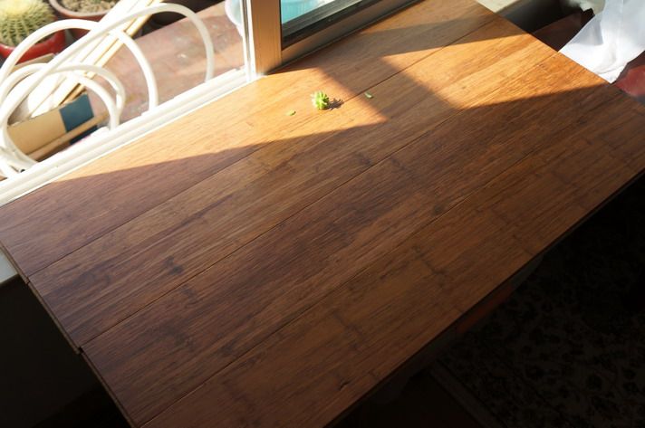 Spring red bamboo flooring factory direct sale carbonized loose knot matte floor heavy bamboo carbonized color