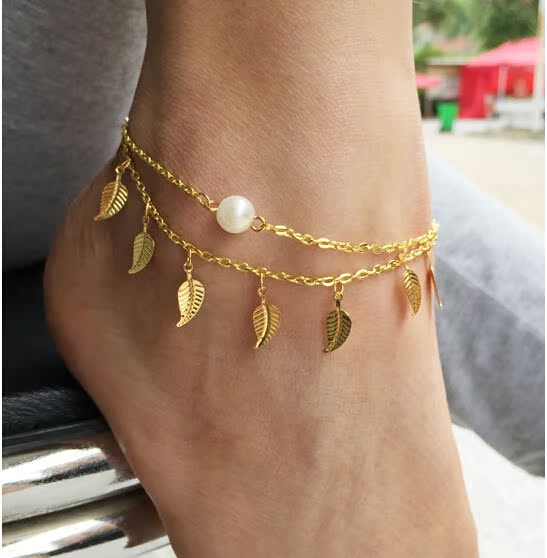 Vòng chân nữ phiên bản Hàn Quốc của các quý cô thời trang đơn giản mặc tua rua xếp lớp lá ngọc trai lắc chân bạc pnj