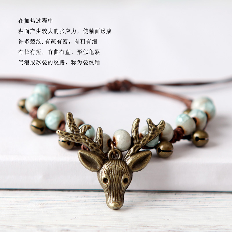 Qingge Handmade Sen Vintage Vòng tay bện Nữ Chuông Vòng tay gốm đơn giản Elk nhỏ với phụ kiện Nữ đá mắt hổ