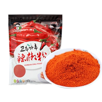 The young man has fine chili powder Korean kimchi Korean style pickled cabbage extra fine chili powder for seasoning.