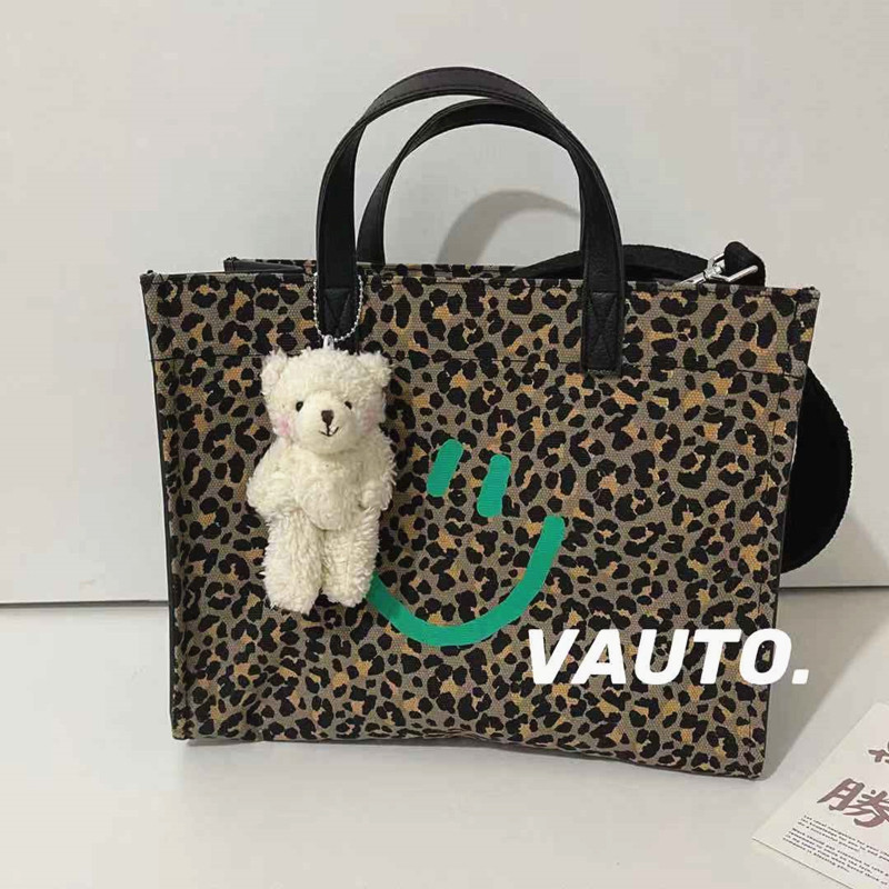 VAUTO Korean smiley face BAO WEN Tot pack fashion handbag canvas bag slanted across women bags with large capacity