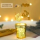Кошка на золотой луне вращает подсвечник