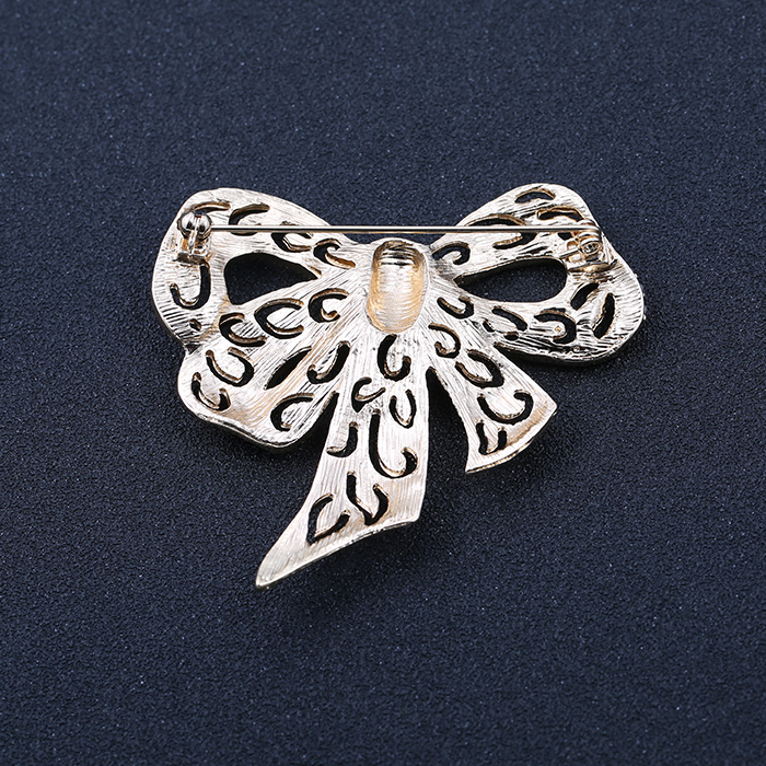 [Golden Phoenix] Trang sức thời trang châu Âu và châu Mỹ mới ngọc trai rỗng nơ áo tinh tế trâm cài nữ - Trâm cài cài áo