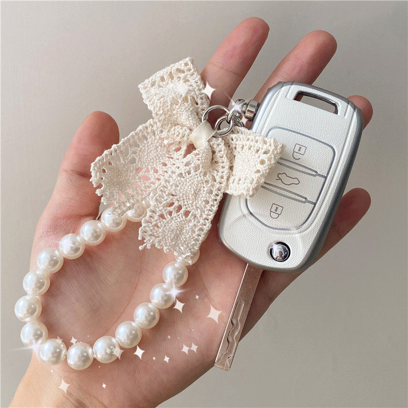 Five-rhombus macro Miniev car key button girl pendant to adorn adorable butterfly knot anti-lose key shell sleeve-Taobao