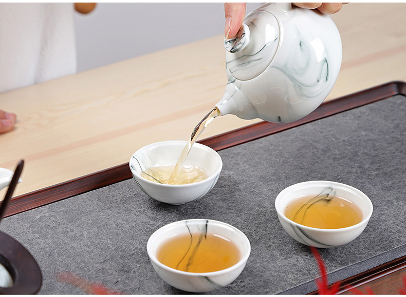 A complete set of ceramic kung fu tea set suits for Chinese style household hand - made teapot teacup tureen tea caddy fixings ink wind