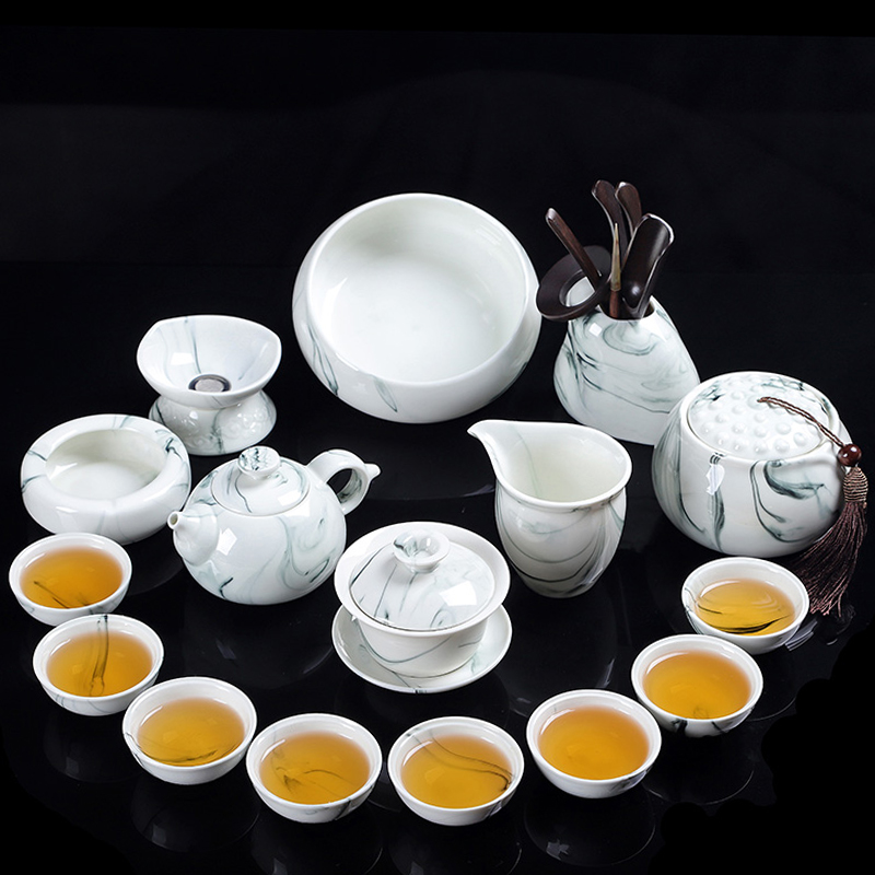 A complete set of ceramic kung fu tea set suits for Chinese style household hand - made teapot teacup tureen tea caddy fixings ink wind