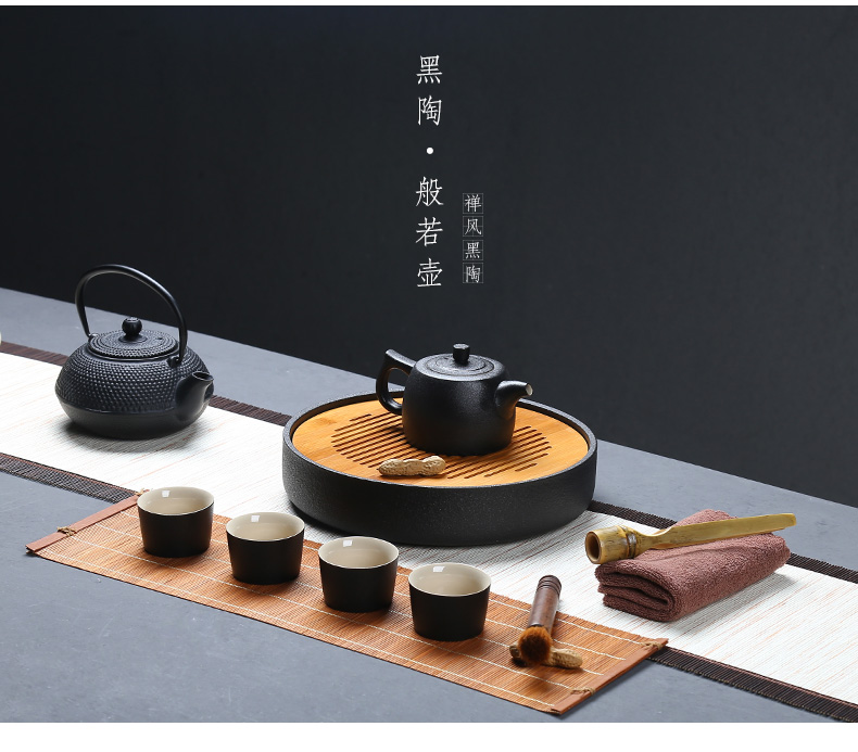 Black pottery tea tray ceramic portable travel bag of a complete set of kung fu tea set suit Japanese household dry teapot teacup