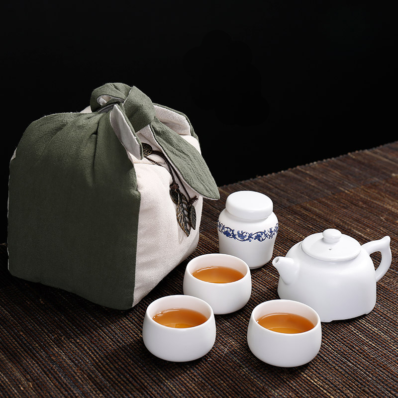 Friends are the family travel portable package mini ceramic kung fu tea set three cups a caddy fixings. A teapot